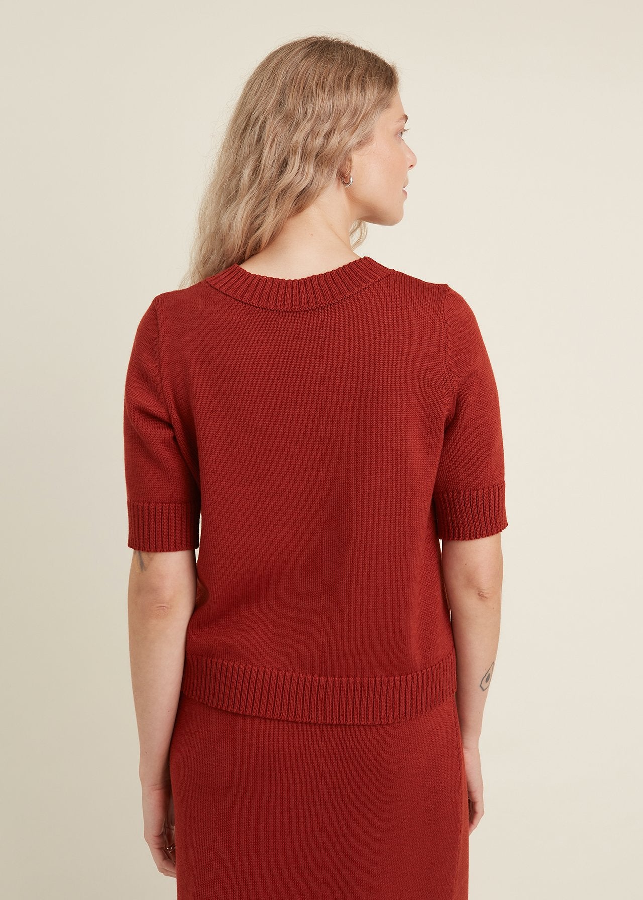 Monala rust red merino knitted top, back view