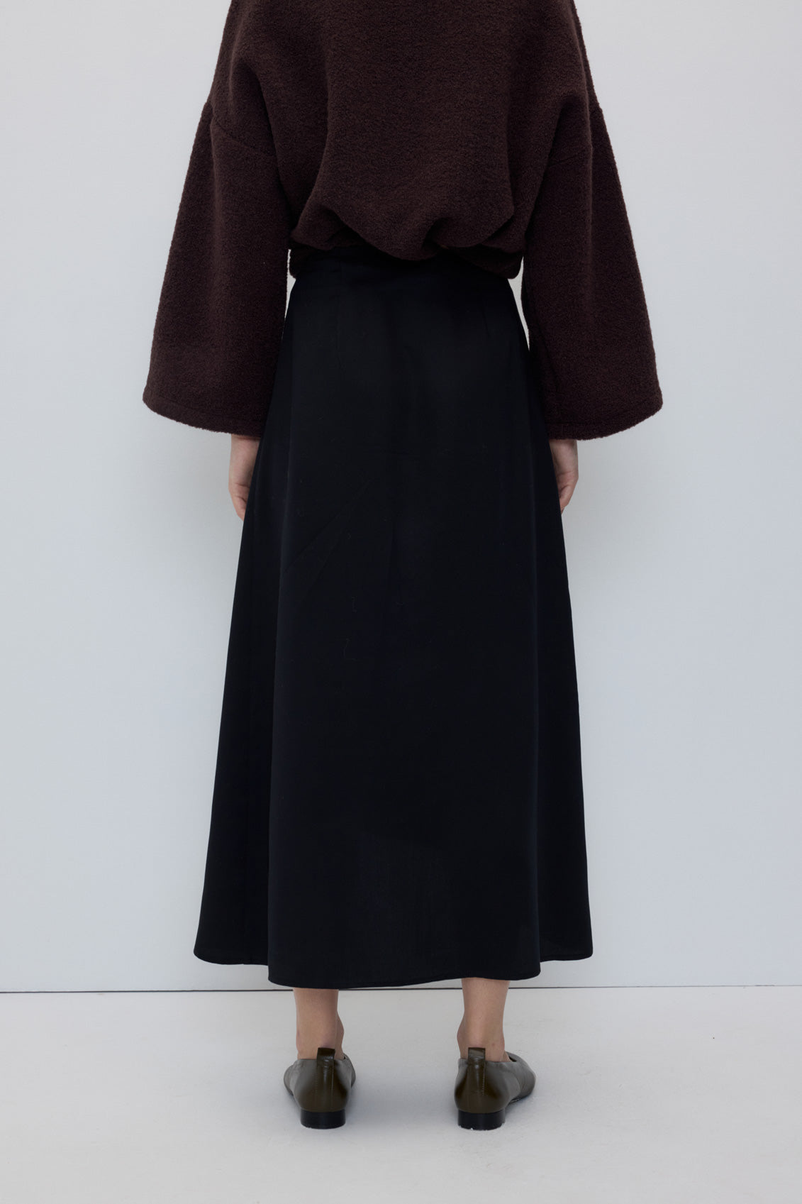 2822-FA-BL_Emma-Skirt-Black_RITA_ROW_WOMEN_AW26_5.jpg?v=1784106950
