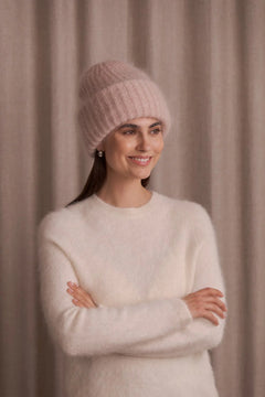 Mohair texture detail on women’s light rose hat