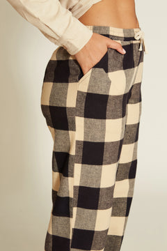 Model wearing black pants styled for everyday use