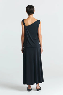 Model wearing black top styled for everyday use