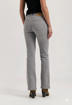 Person wearing gray jeans on a white background