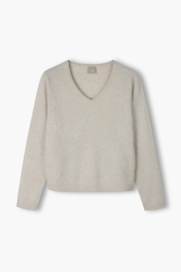 Latte beige cashmere V-neck sweater, front view