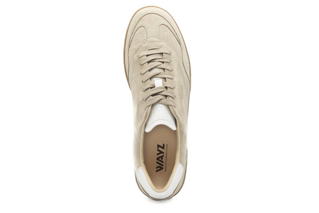 Beige sneaker with white sole on a white background