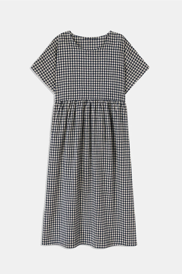 Black and white checkered dress on a white background