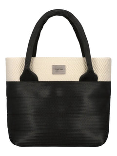 Black and beige tote bag with a visible brand label on a white background