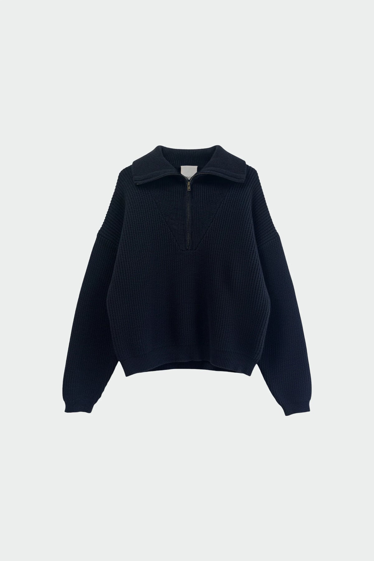 A dark navy blue ribbed knit sweater with a half-zip collar, displayed against a light gray background.