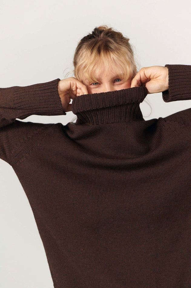 Chocolate merino wool turtleneck sweater, side view