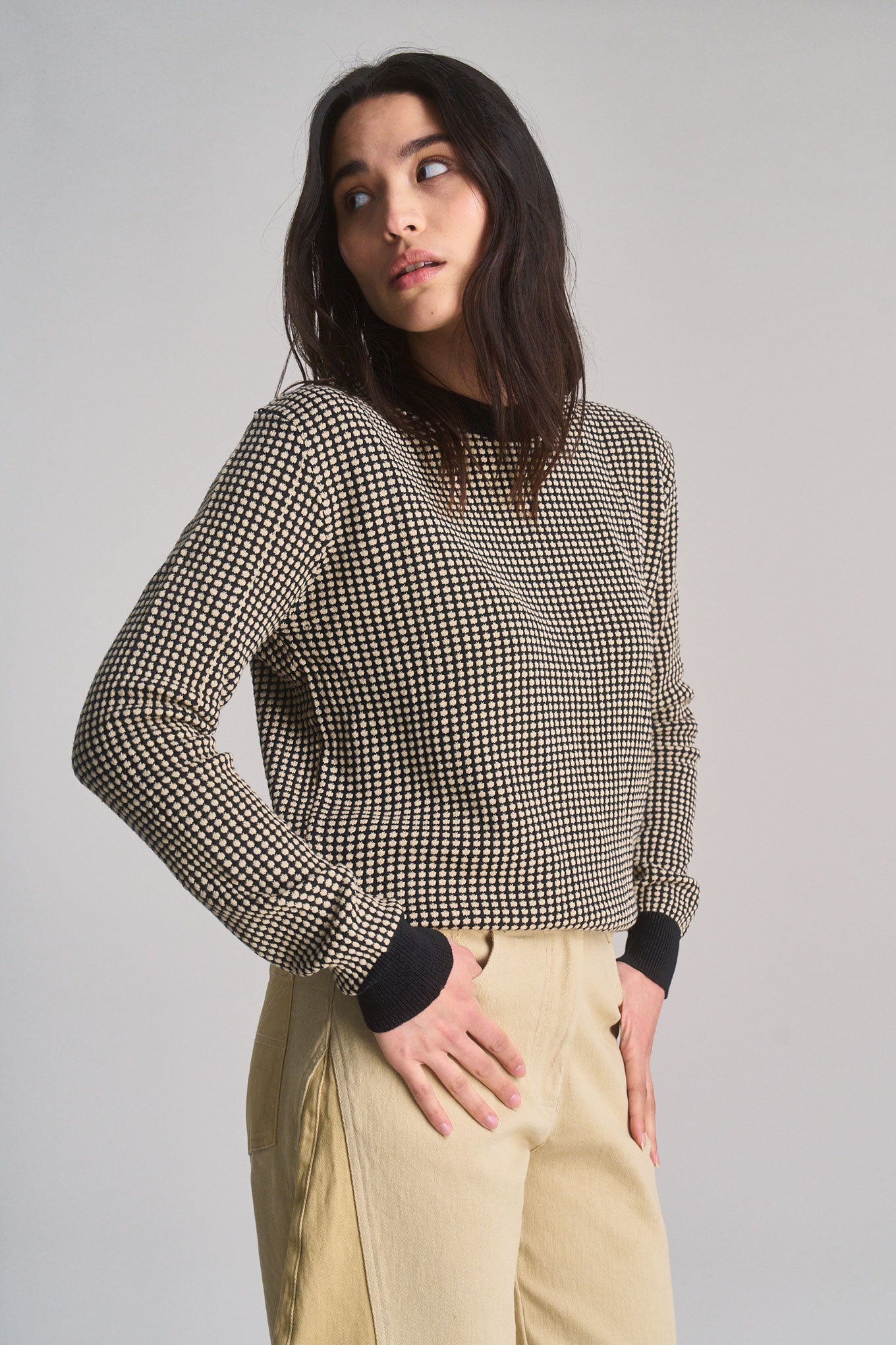 Black and cream white organic cotton sweater, front view