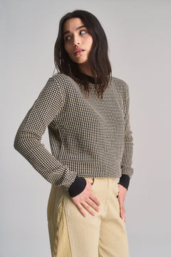 Black and cream white organic cotton sweater, front view
