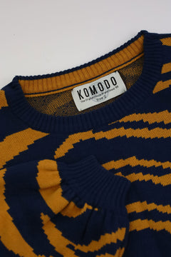 Woman wearing Komodo navy tiger print jumper