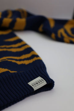 Close-up of tiger print organic cotton knit texture