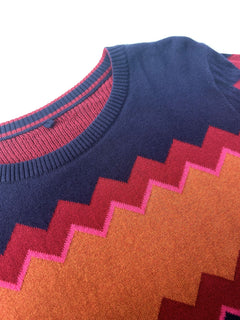 Woman wearing Komodo chevron blue knitted top