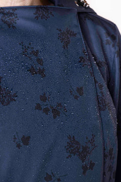rainsisters-coat-blue-frost-wateerproof-dark-blue-black-print-close-up.jpg?v=1779049144