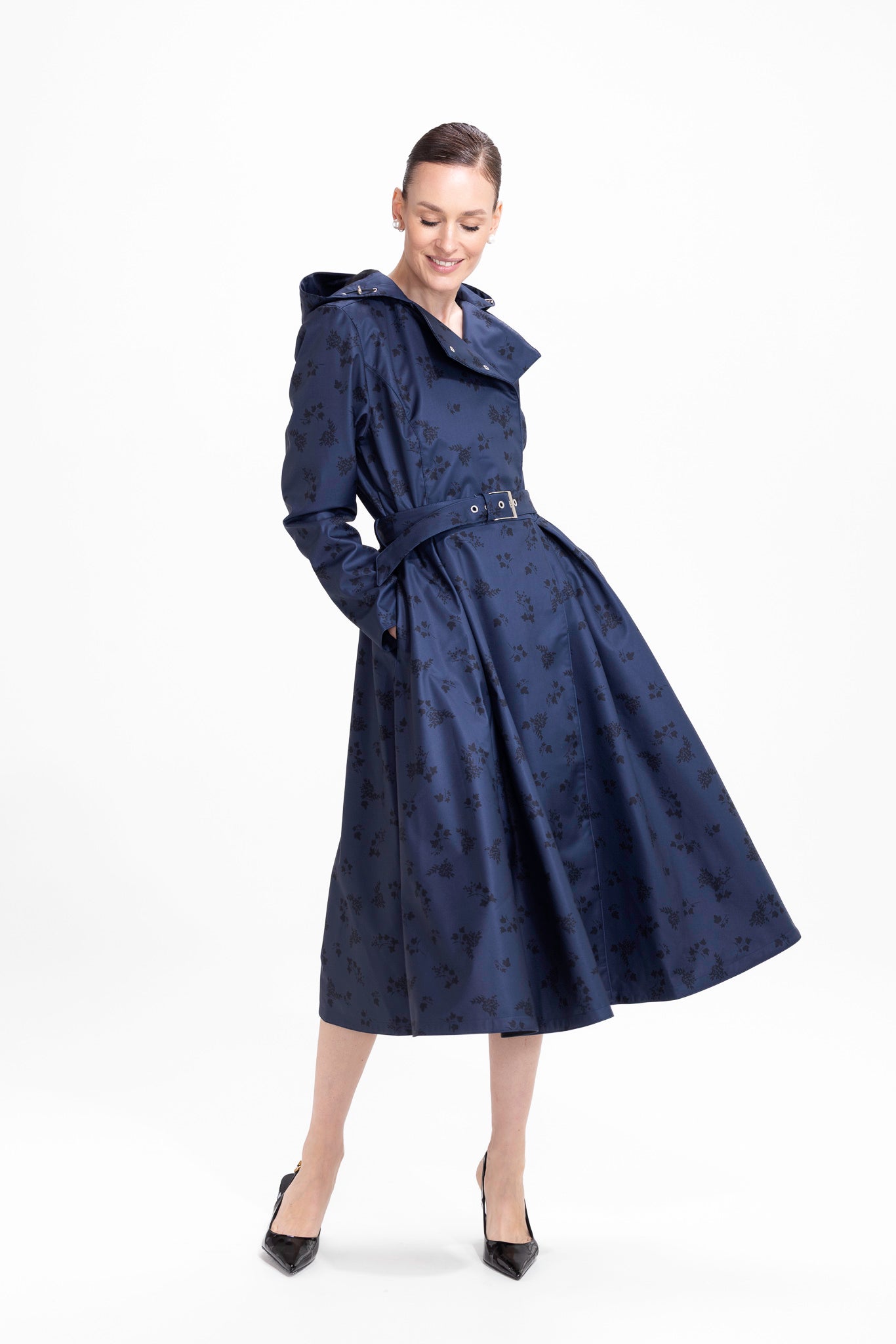 rainsisters-coat-blue-frost-wateerproof-dark-blue-black-print-in-motion.jpg?v=1779049144