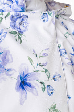 rainsisters-coat-blue-whisper-waterproof-white-floral-print-close-up.jpg?v=1779049990