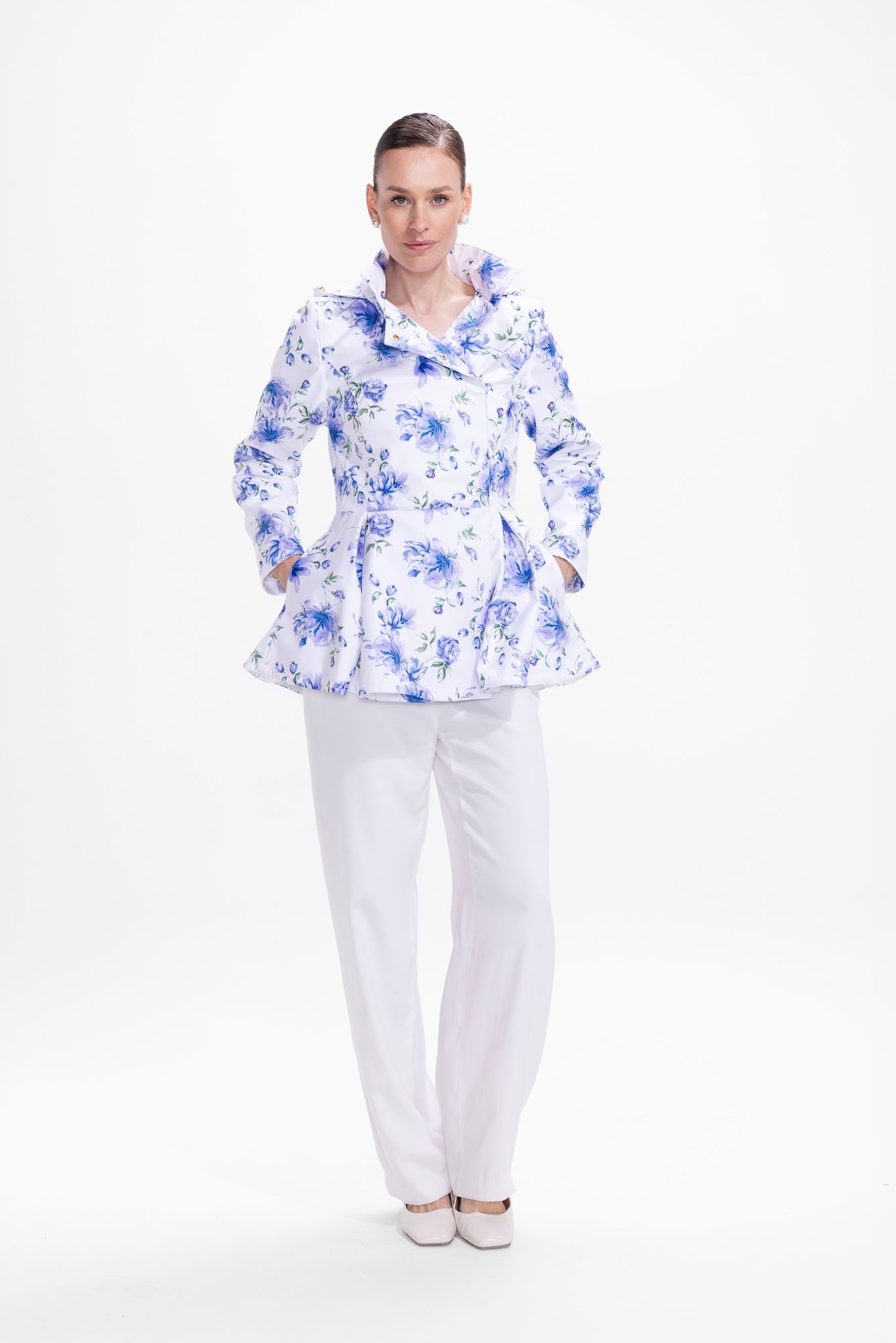rainsisters-coat-blue-whisper-waterproof-white-floral-print-front.jpg?v=1779049991