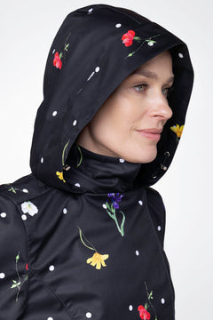 rainsisters-coat-cosmic-meadow-waterproof-black-floral-print-hood.jpg?v=1779051266