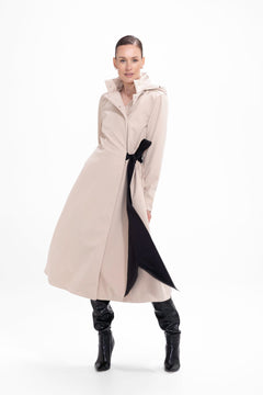 rainsisters-coat-desirable-bow-waterproof-beige-in-motion.jpg?v=1779052020