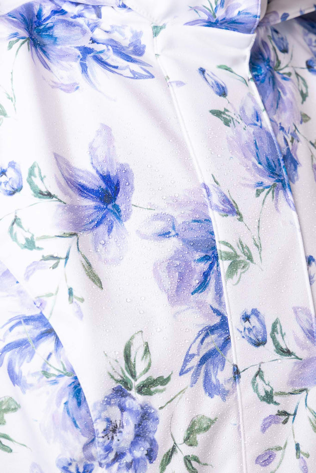 rainsisters-coat-floral-white-waterproof-white-floral-close-up.jpg?v=1779052631
