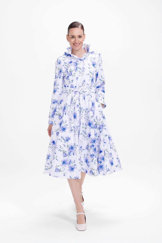 rainsisters-coat-floral-white-waterproof-white-floral-in-motion.jpg?v=1779052631