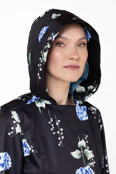 rainsisters-coat-flower-moon-waterproof-black-floral-hood.jpg?v=1779052441