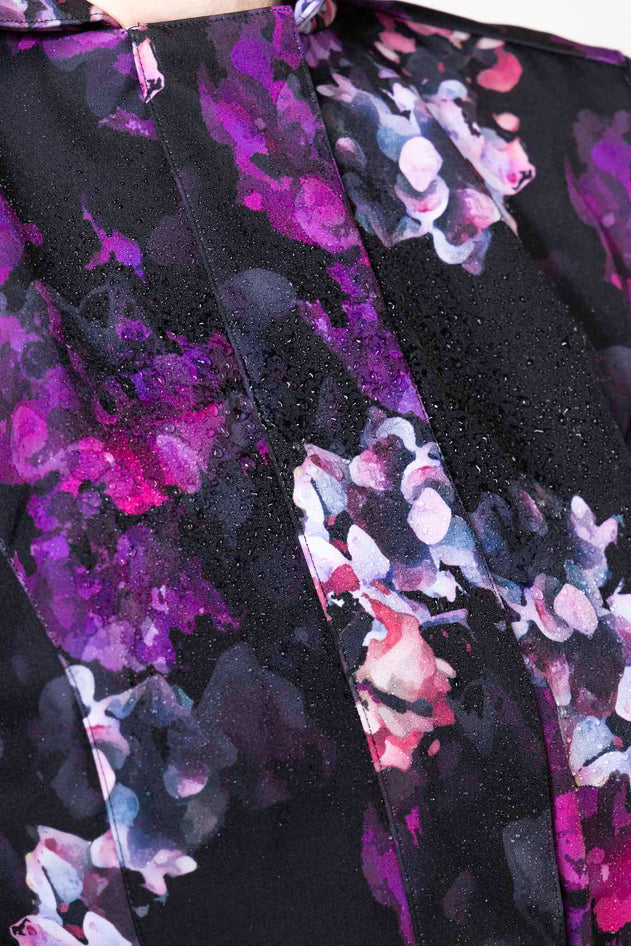 rainsisters-coat-hortense-waterproof-black-floral-close-up.jpg?v=1779053578