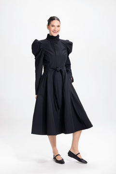 rainsisters-coat-majestic-night-waterproof-black-in-motion.jpg?v=1779054199