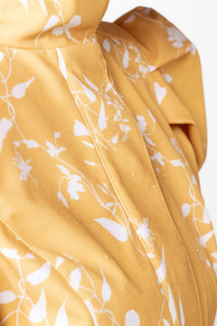 rainsisters-coat-majestic-yellow-waterproof-yellow-floral-fabric.jpg?v=1779054613