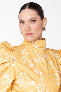 rainsisters-coat-majestic-yellow-waterproof-yellow-floral-front-close-up.jpg?v=1779054614