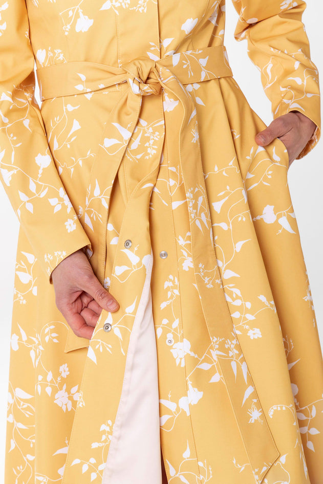 rainsisters-coat-majestic-yellow-waterproof-yellow-floral-lining.jpg?v=1779054614