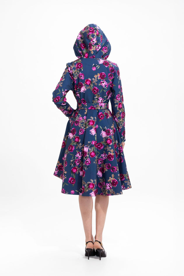 rainsisters-coat-misty-rose-waterproof-blue-floral-back.jpg?v=1779055156