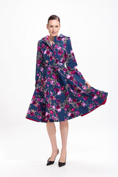 rainsisters-coat-misty-rose-waterproof-blue-floral-in-motion.jpg?v=1779055155