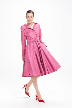 rainsisters-coat-raspberry-sorbet-waterproof-pink-floral-in-motion.jpg?v=1779056642