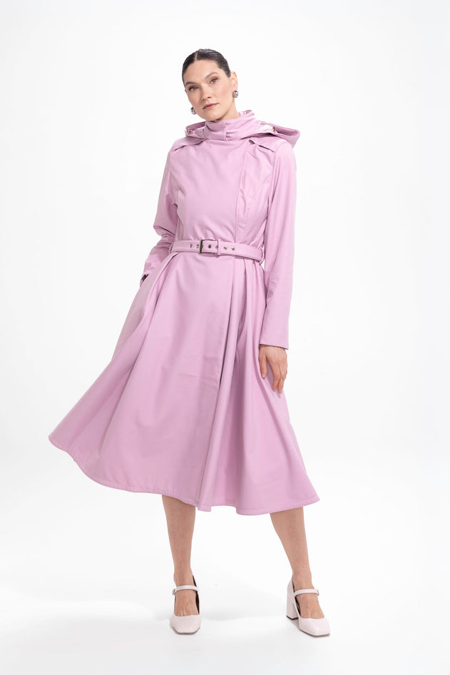 rainsisters-coat-rosie-bow-waterproof-pink-in-motion.jpg?v=1779056900