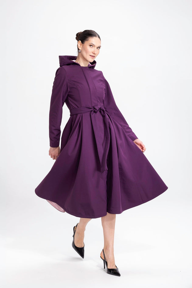 rainsisters-coat-ruby-purple-waterproof-purple-in-motion.jpg?v=1779057340