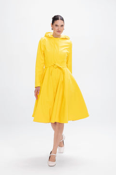 rainsisters-coat-yellow-sun-waterproof-yellow-in-motion.jpg?v=1779058679