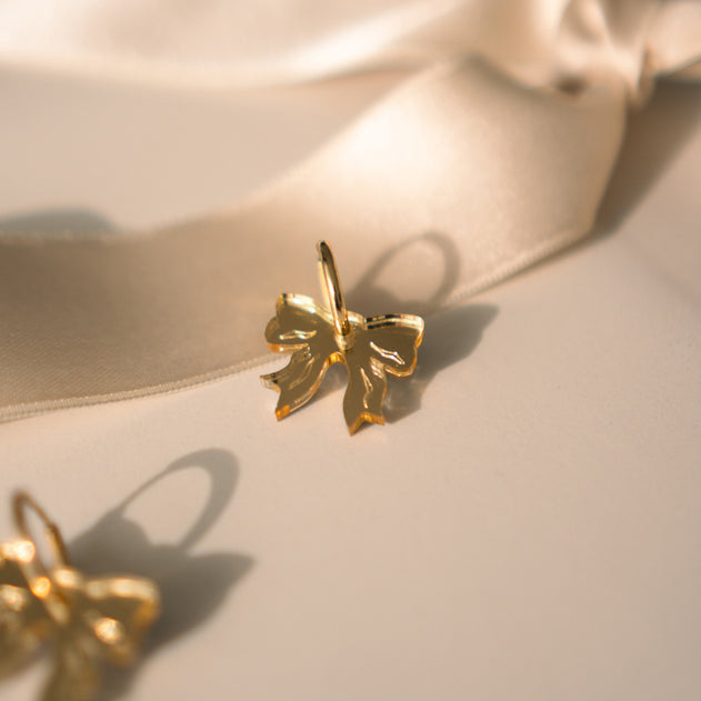 Take A Bow Earrings Gold