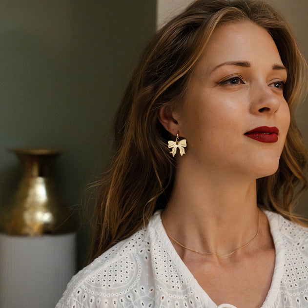 Take A Bow Earrings Gold