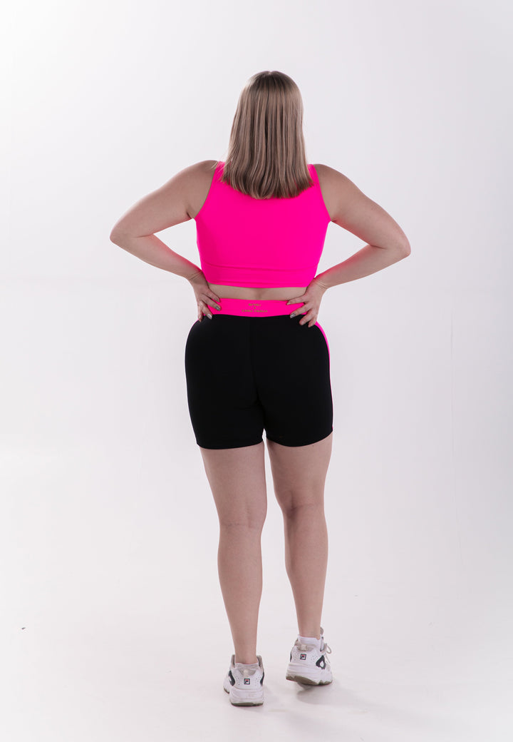  - Revoel X Erika Vikman Stellar Biker Shorts in Black & Shock Pink